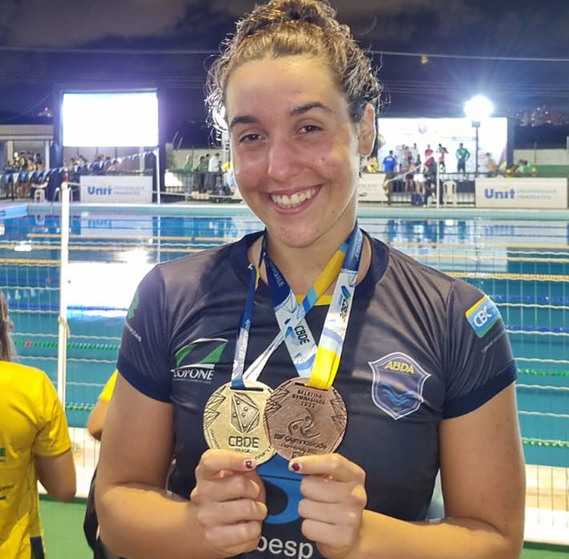 A atleta venceu a prova dos 200m livre, ficou em 3� lugar nos 50m livre e em 4� nos 100m livre.